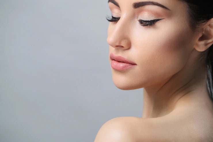 Woman with long, healthy-looking brunette hair — MD® hair serum buyer's guide