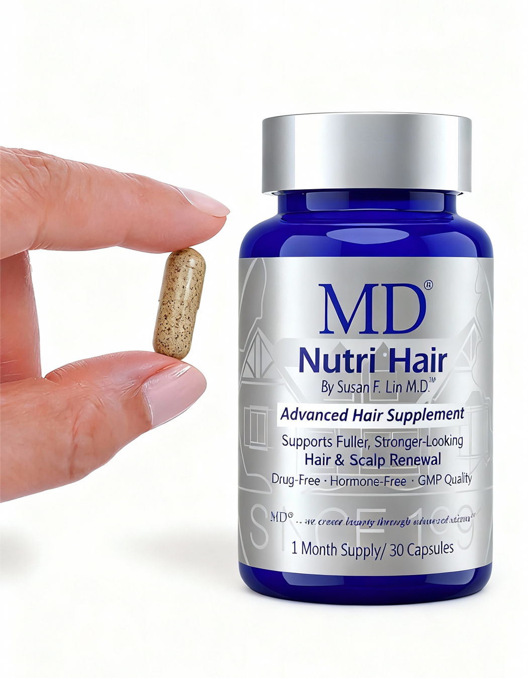 Hand holding clear vegetable capsule with natural brown ingredients from MD Nutri Hair – hair growth supplement with clean, plant-based formulation, bottle in background – MD Hair