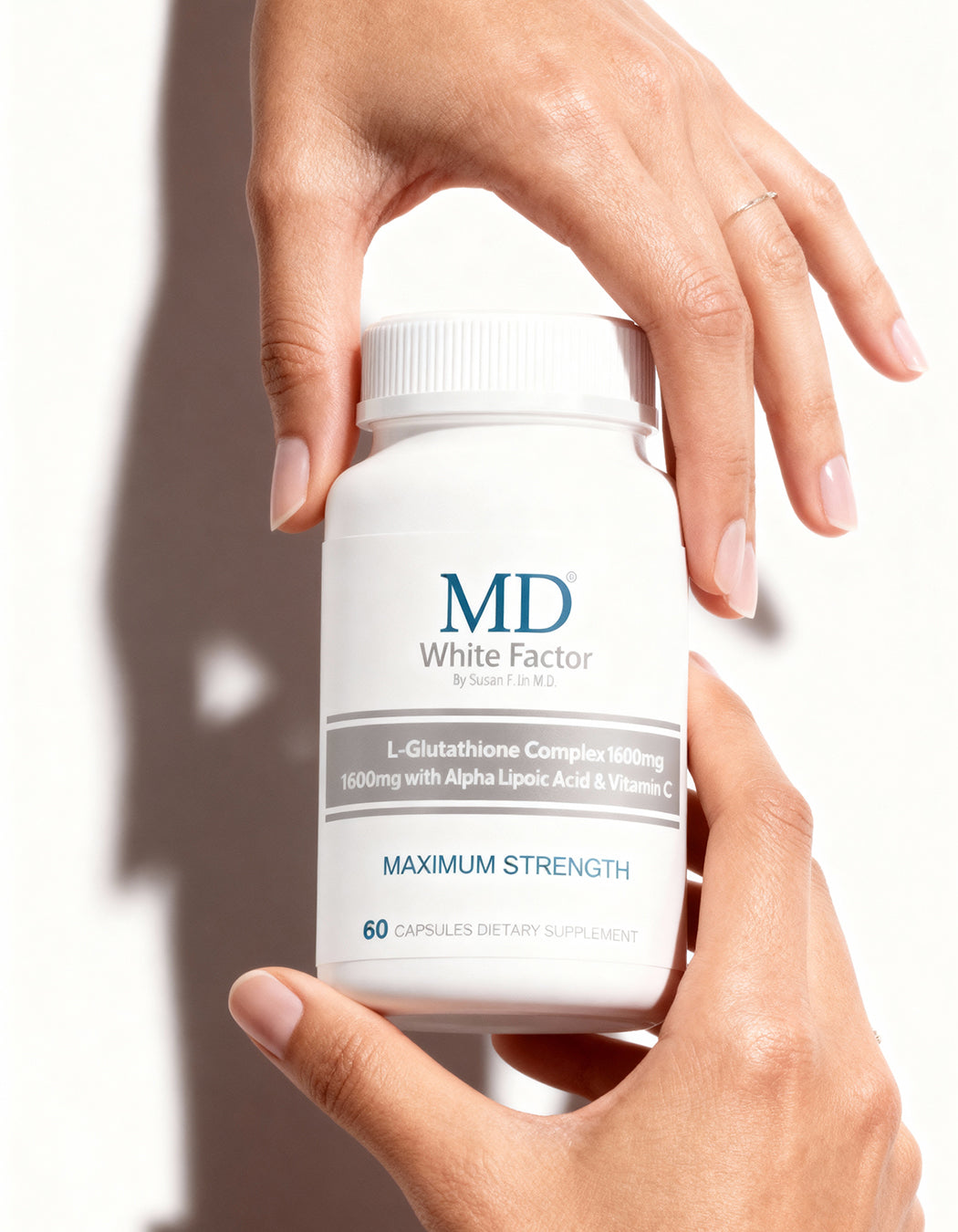 MD® White Factor glutathione, vitamin C and alpha-lipoic acid antioxidant complex for a radiant-looking complexion.